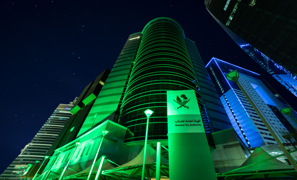 Celebrating Qatar Family Day... The General Tax Authority's Headquarters Shines with Green Lighting